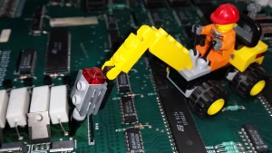 pinball circuit board repair in an animated Lego cartoon style 